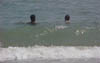 Yanek_and_Brian_swimming